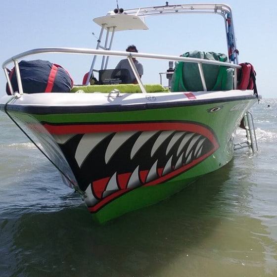 a small boat in a body of water