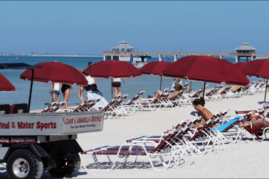 a group of people riding on the back of a truck
