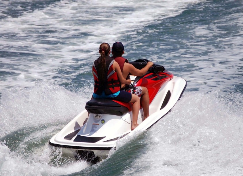 a man riding a wave on a surfboard in the water
