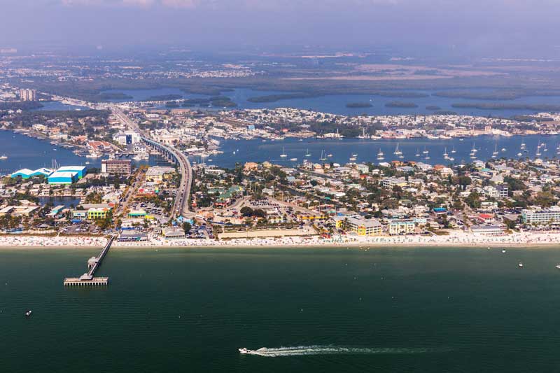 Florida-Marine-Life-of-Fort-Myers.1 a large body of water with a city in the background