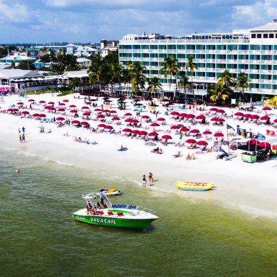 a group of people riding on the back of a boat
