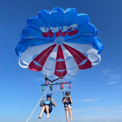 a parachute with a body of water